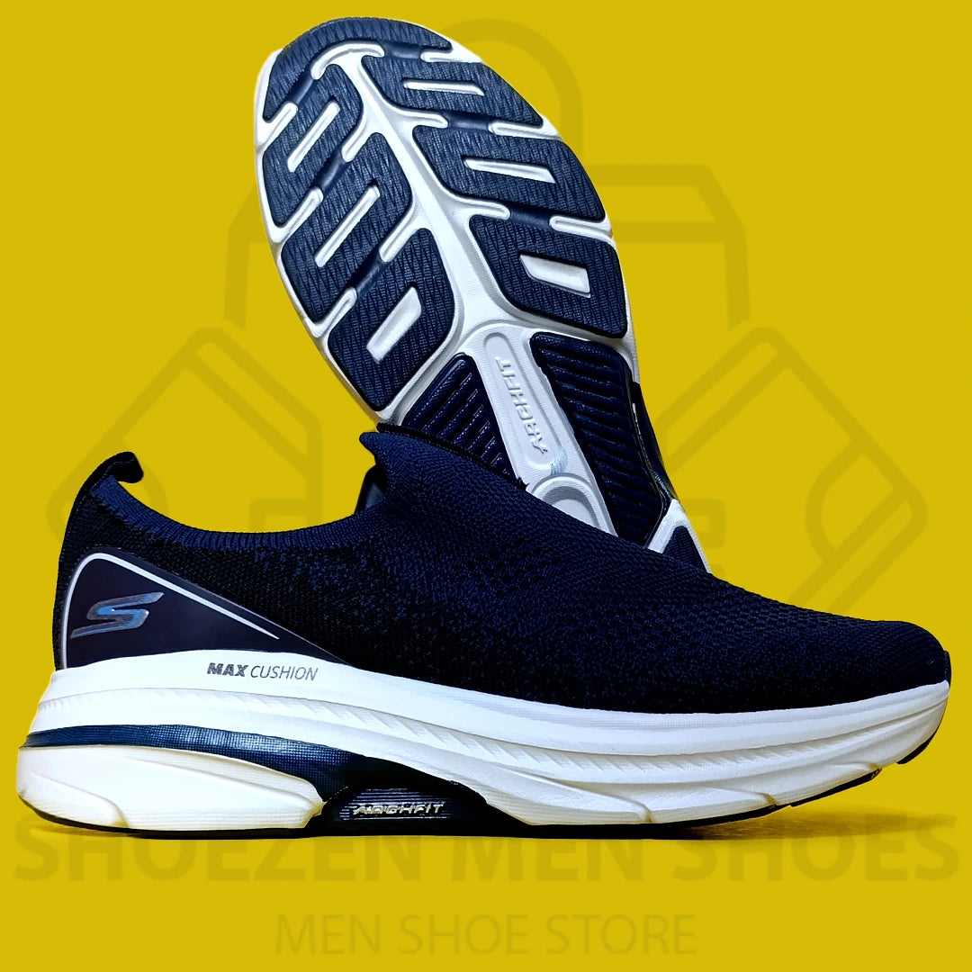 ARCHFIT MAX CUSHION SKECHERS - SHOEZEN MEN SHOES - Navy running shoe with white sole on a yellow background