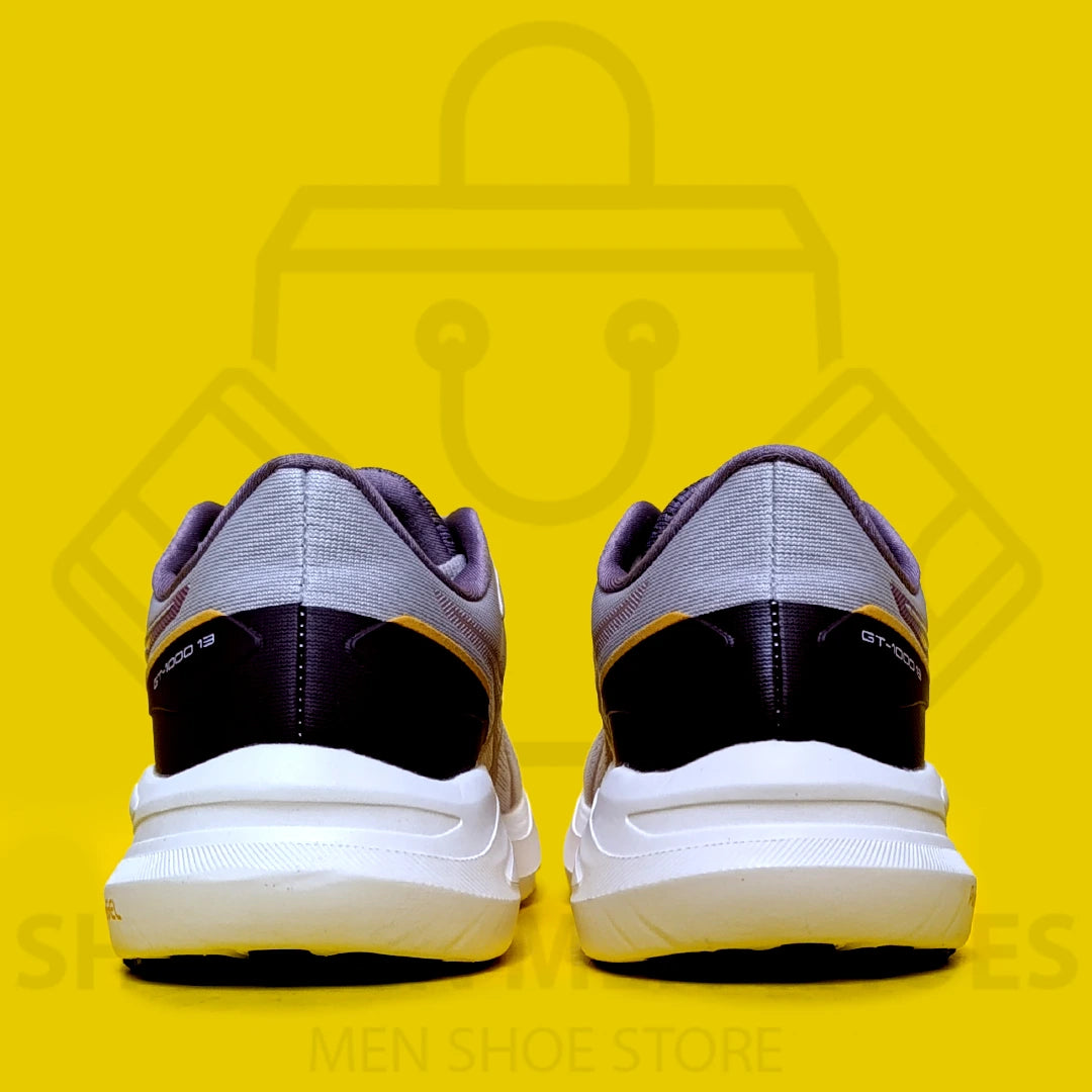 ASICS GEL "GT-1000" JOGGERS - SHOEZEN MEN SHOES - White running shoe with colorful sole on a yellow background