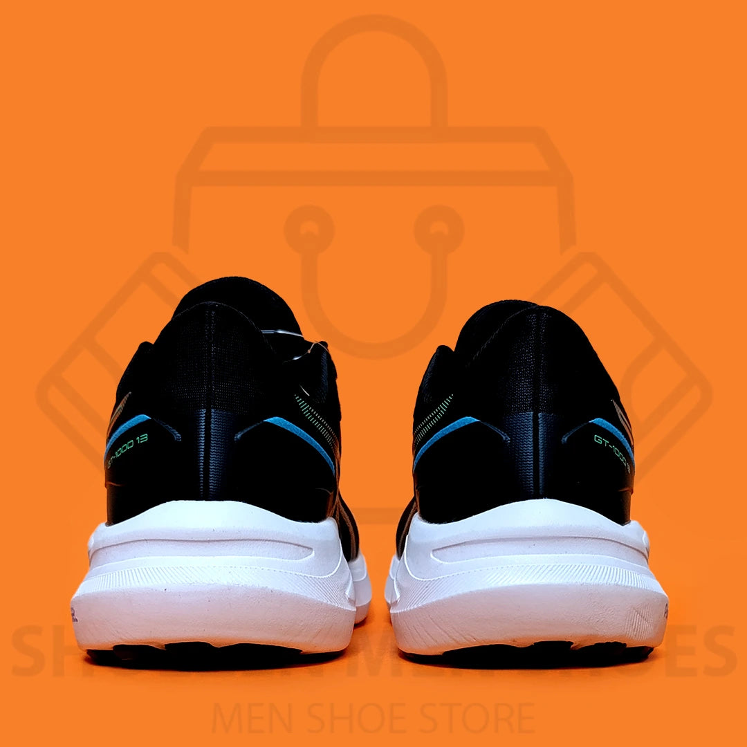 ASICS GEL "GT-1000" JOGGERS - SHOEZEN MEN SHOES - Black running shoe with green sole on an orange background