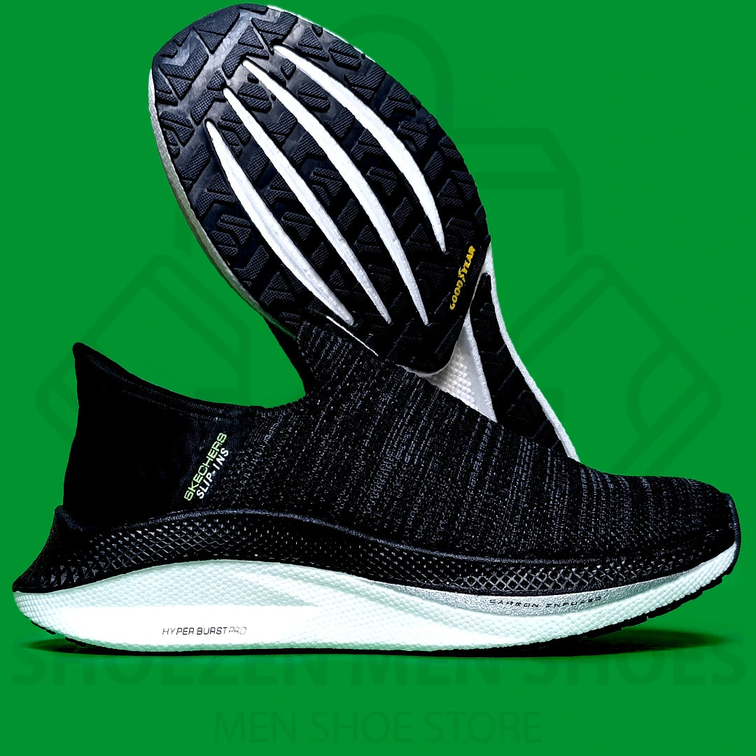 HYPER BURST PRO SLIP-INS SKECHERS - SHOEZEN MEN SHOES - Black running shoe with white sole on a green background