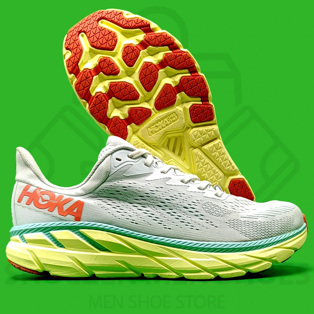 Hoka One One CLIFTON 7 MORNING MIST Jogger - Shoezen Men Shoes - Hoka running shoe with green and red sole on a green background