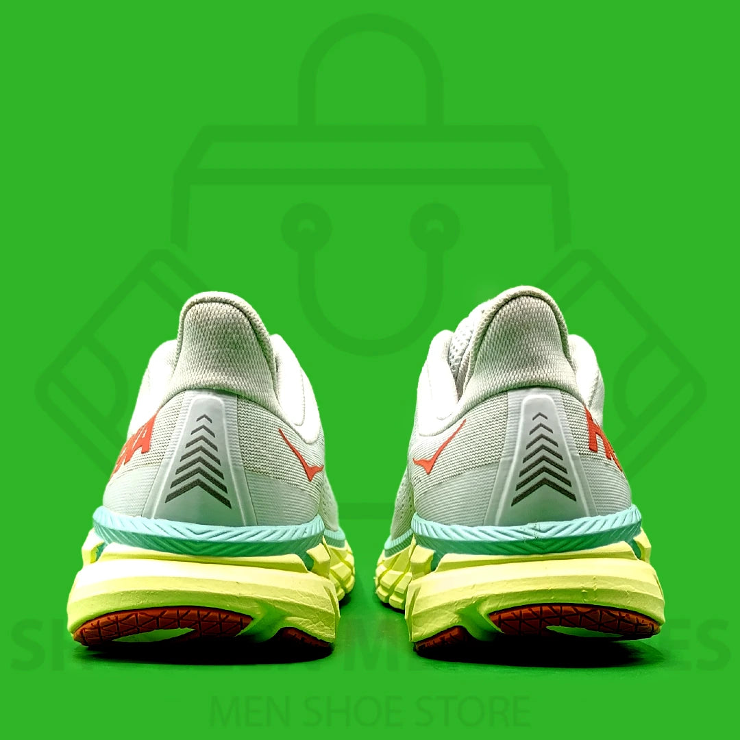 Hoka One One CLIFTON 7 MORNING MIST Jogger - Shoezen Men Shoes - Hoka running shoe with green and red sole on a green background