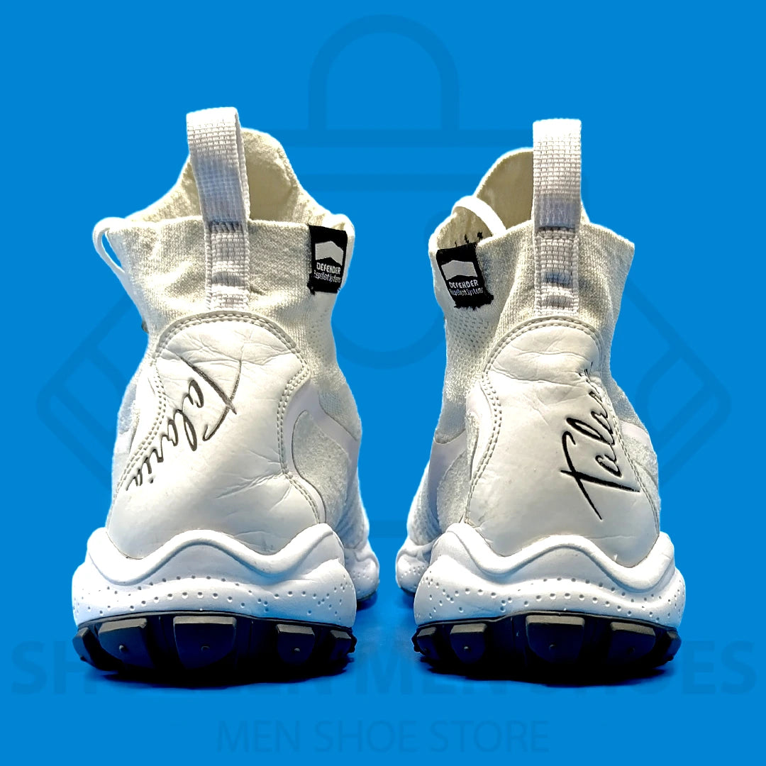 Nk Zoom Talaria Mid FK white Joggers - Shoezen Men Shoes - White sneaker with a textured sole on a blue background