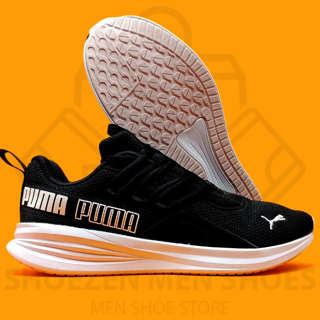 PM Black Star Vital Refresh Joggers - Shoezen Men Shoes - Black Puma sneaker with white sole on an orange background