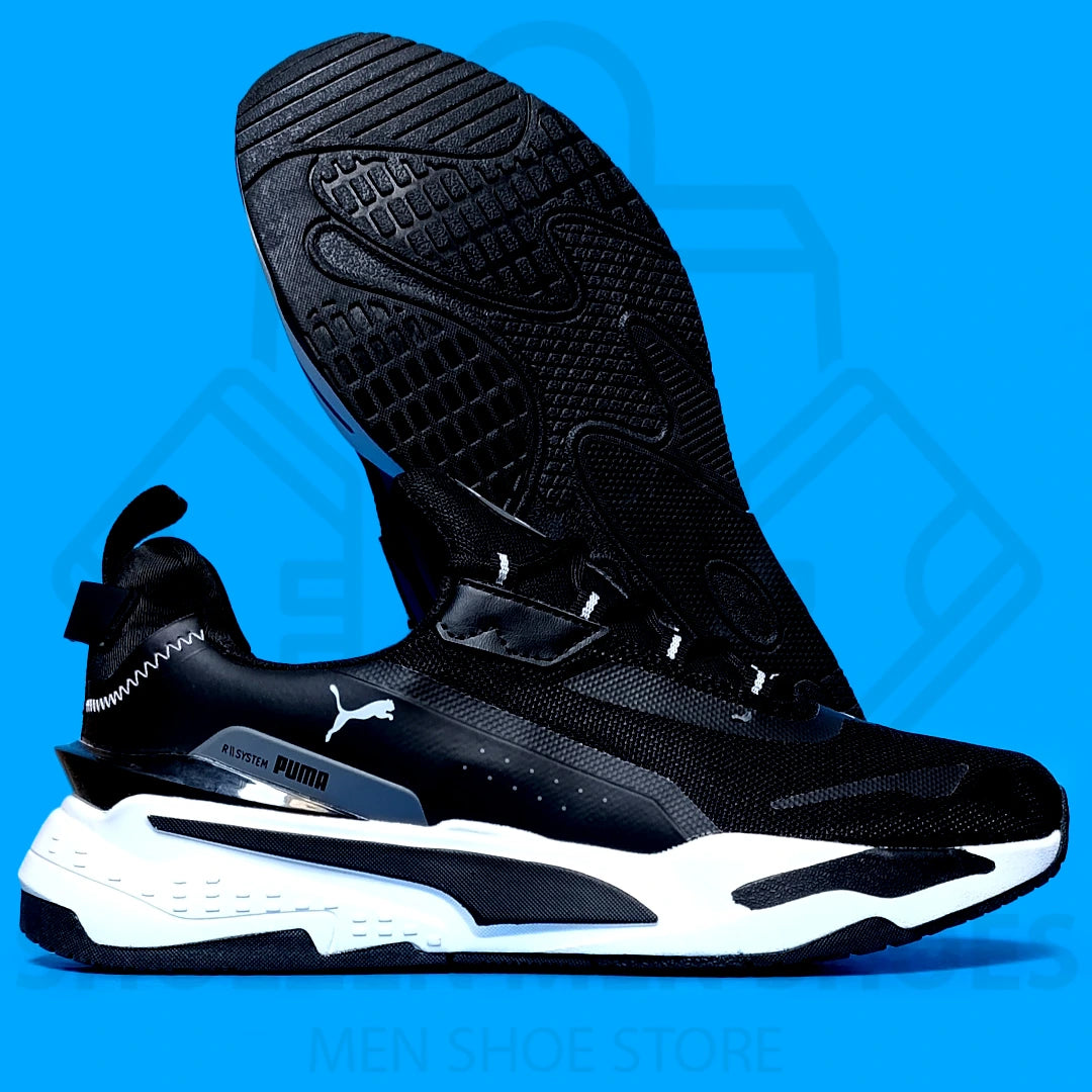 PUMA RS JOGGERS  - SHOEZEN MEN SHOES - Black and white sneaker with Puma logo on a blue background