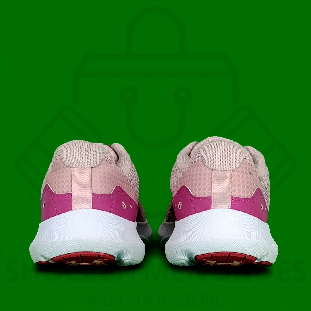 Women's UA Surge 3 Running Shoes - Shoezen Men Shoes - Pink running shoe with a white sole on a green background