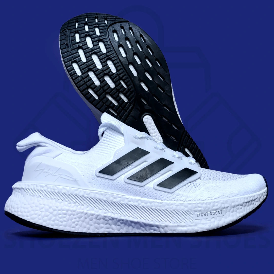 ADIDAS LIGHT BOOST JOGGERS  - SHOEZEN MEN SHOES - White Adidas running shoe with black sole on a blue background