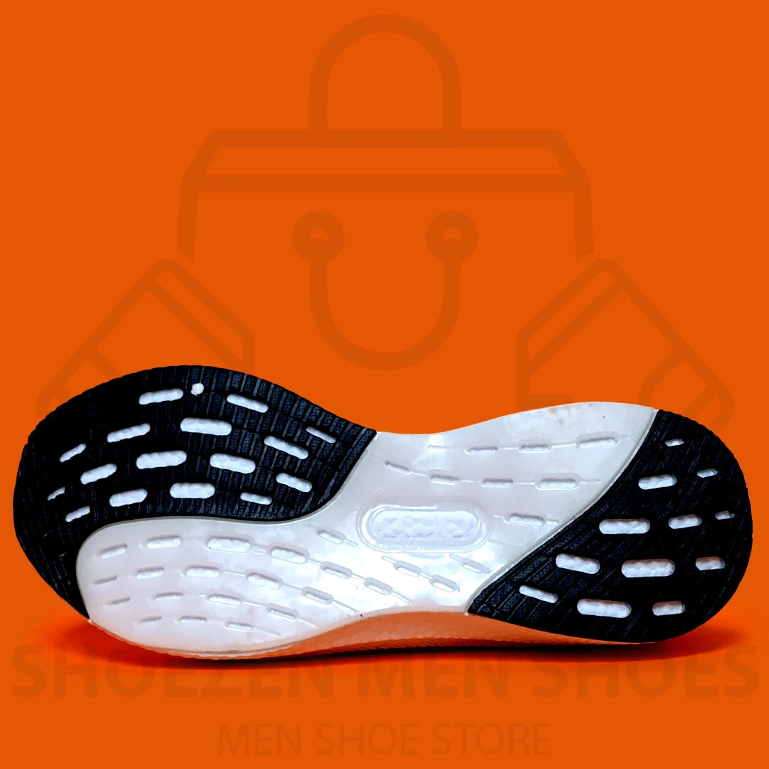 ADI LIGHT BOOST JOGGERS - SHOEZEN MEN SHOES - White and green running shoe with black accents on an orange background