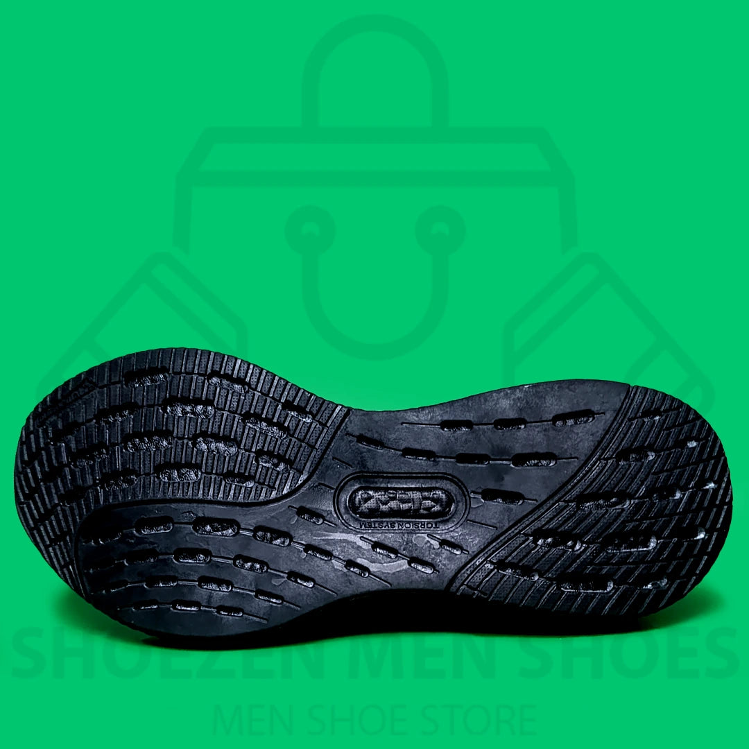 ADI LIGHT BOOST JOGGERS - SHOEZEN MEN SHOES - Black Adidas sneaker on a green background