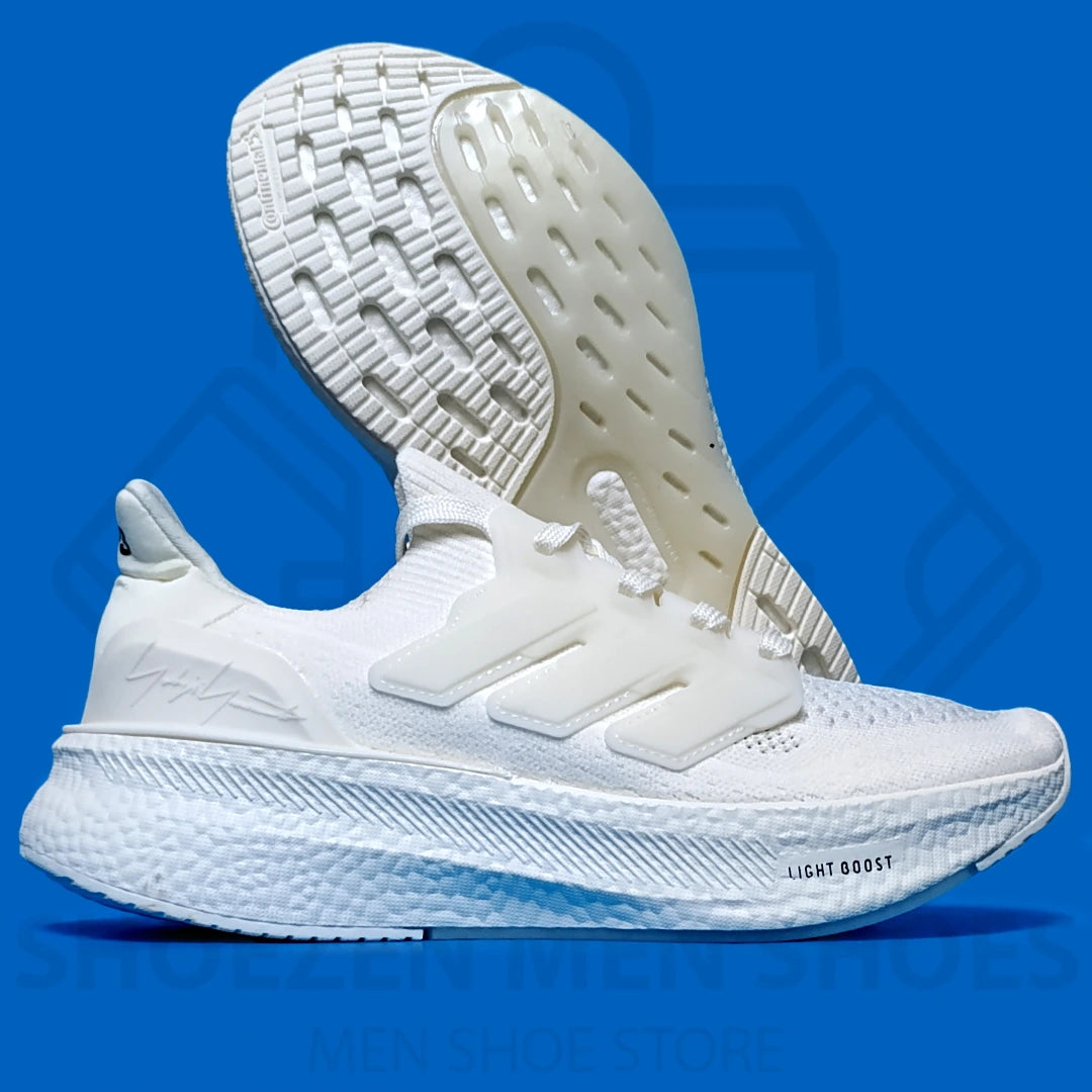 ADI LIGHT BOOST JOGGERS - SHOEZEN MEN SHOES - White running shoe with Adidas logo on a blue background