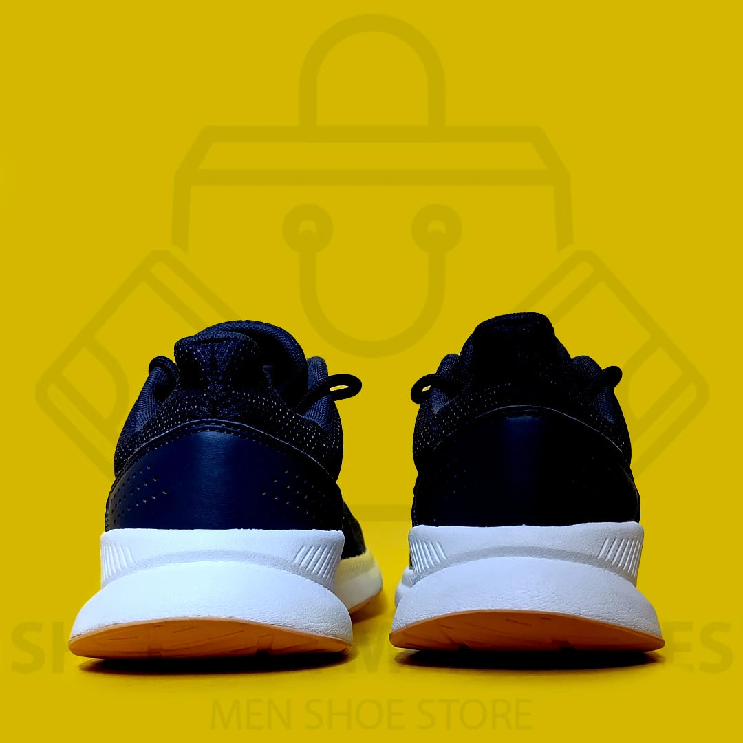 ADI RUN FALCON JOGGERS - SHOEZEN MEN SHOES - Navy running shoe with pink stripes on a yellow background