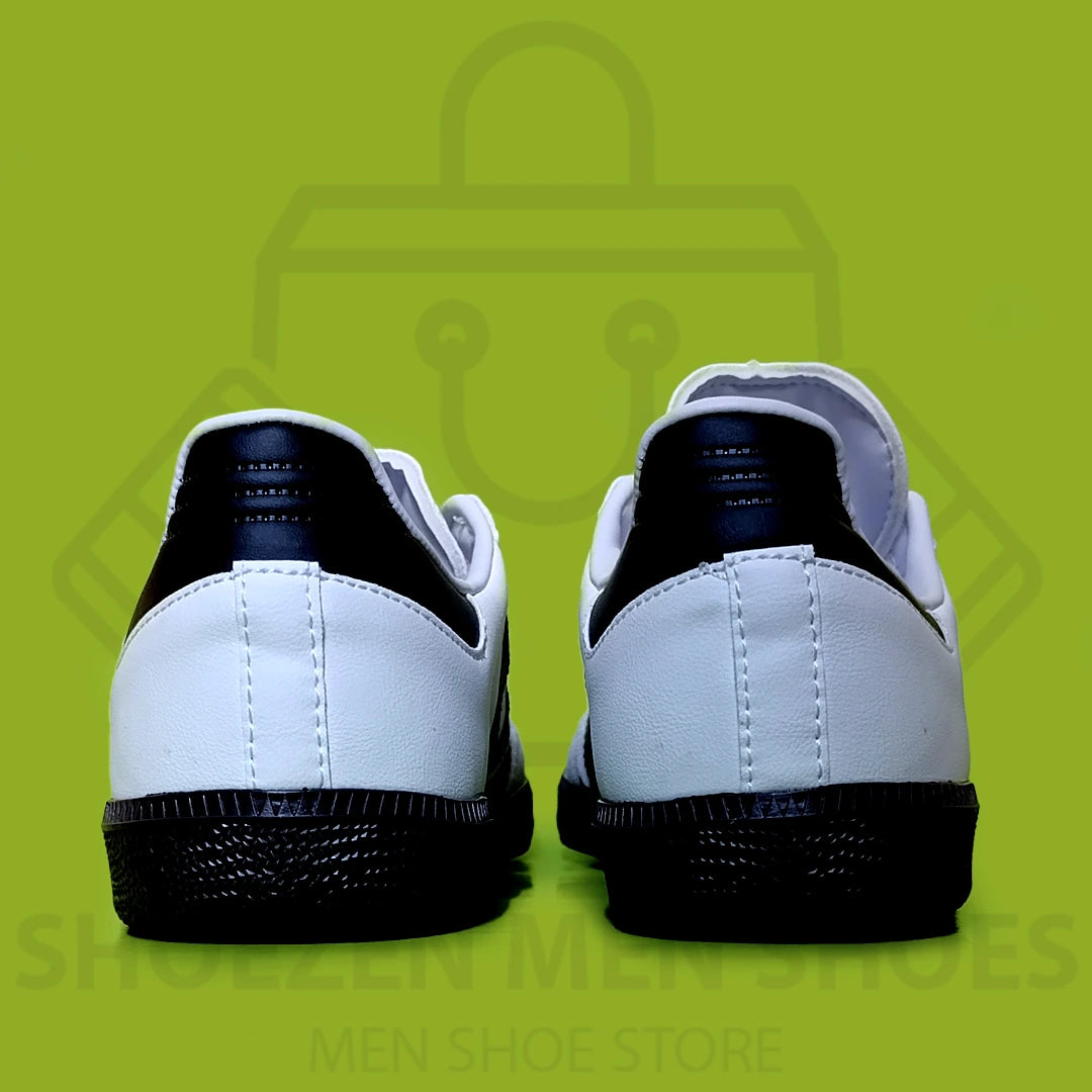 ADI SAMBA OG SNEAKERS - SHOEZEN MEN SHOES - White Adidas sneaker with black stripes and sole on a green background