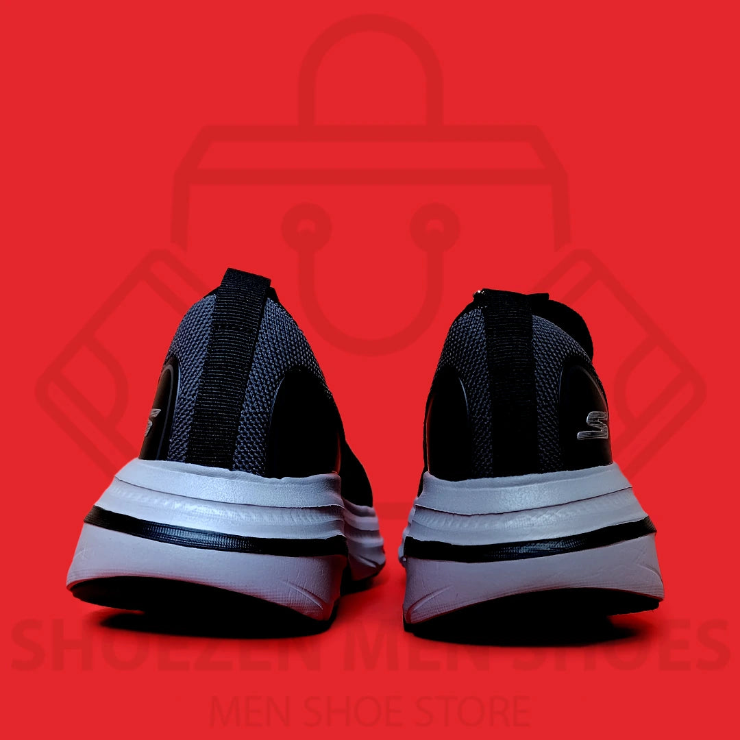 ARCHFIT MAX CUSHION SKECHERS - SHOEZEN MEN SHOES - Black running shoe with white sole on a red background