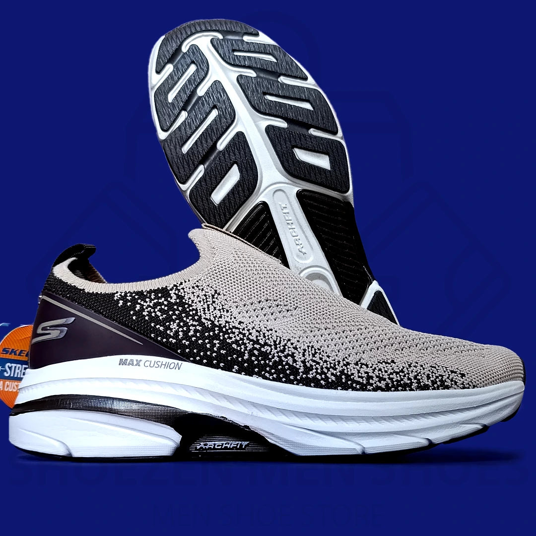 ARCHFIT MAX CUSHION SKECHERS - SHOEZEN MEN SHOES - Gray and black running shoe with white sole on a blue background