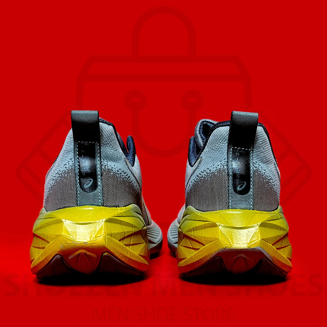 ASCIS NOVABLAST 4 JOGGERS  - SHOEZEN MEN SHOES - Gray running shoe with yellow sole on a red background