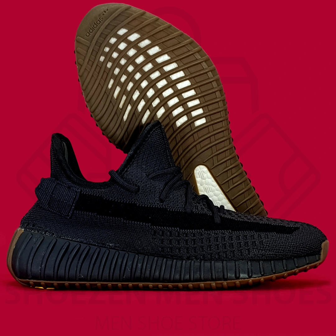 Adi Yeezy Boost 350 V2 Cinder Joggers - Shoezen Men Shoes - Black sneaker with brown sole on a red background