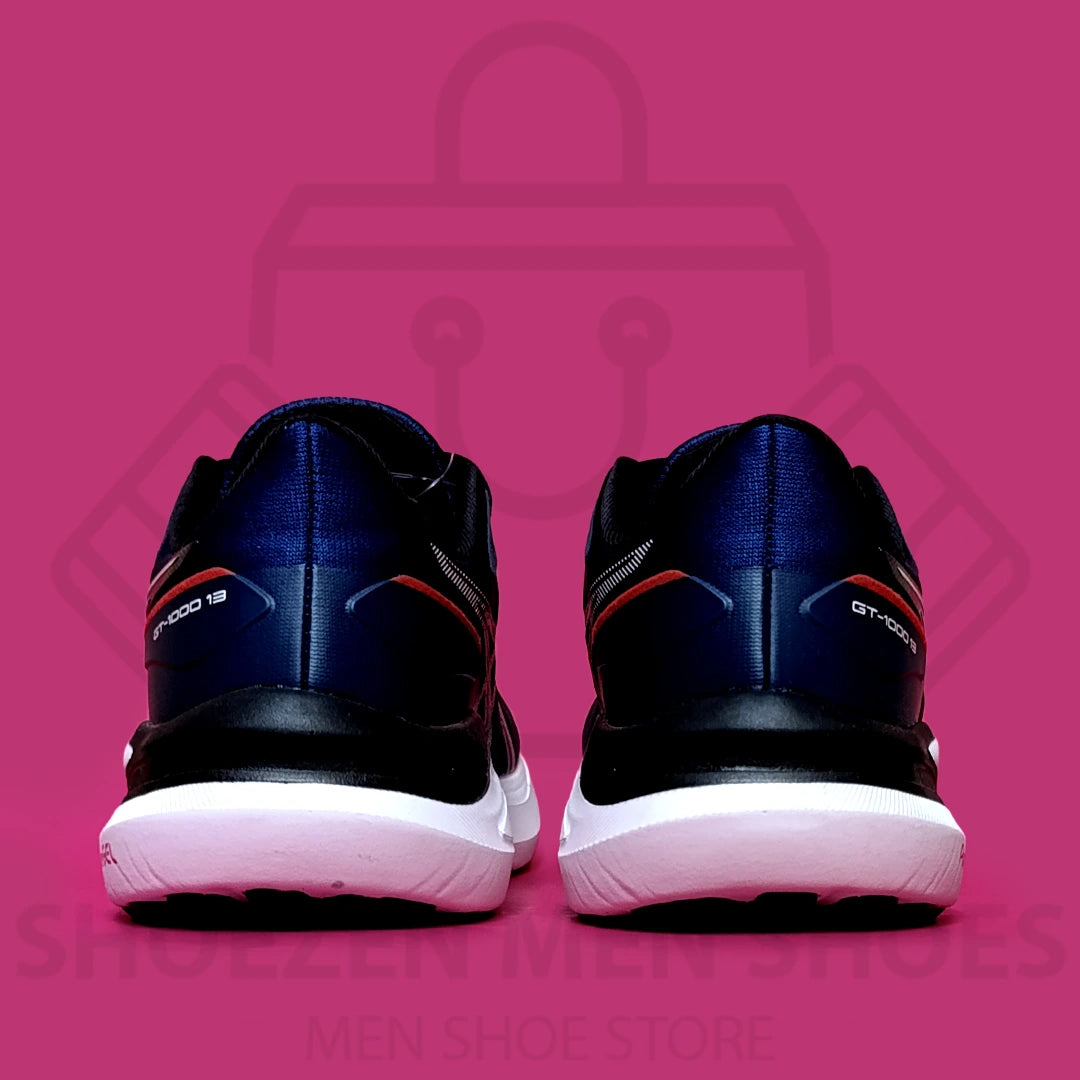 ASICS GEL "GT-1000" JOGGERS - SHOEZEN MEN SHOES - Blue running shoe with white sole on a pink background