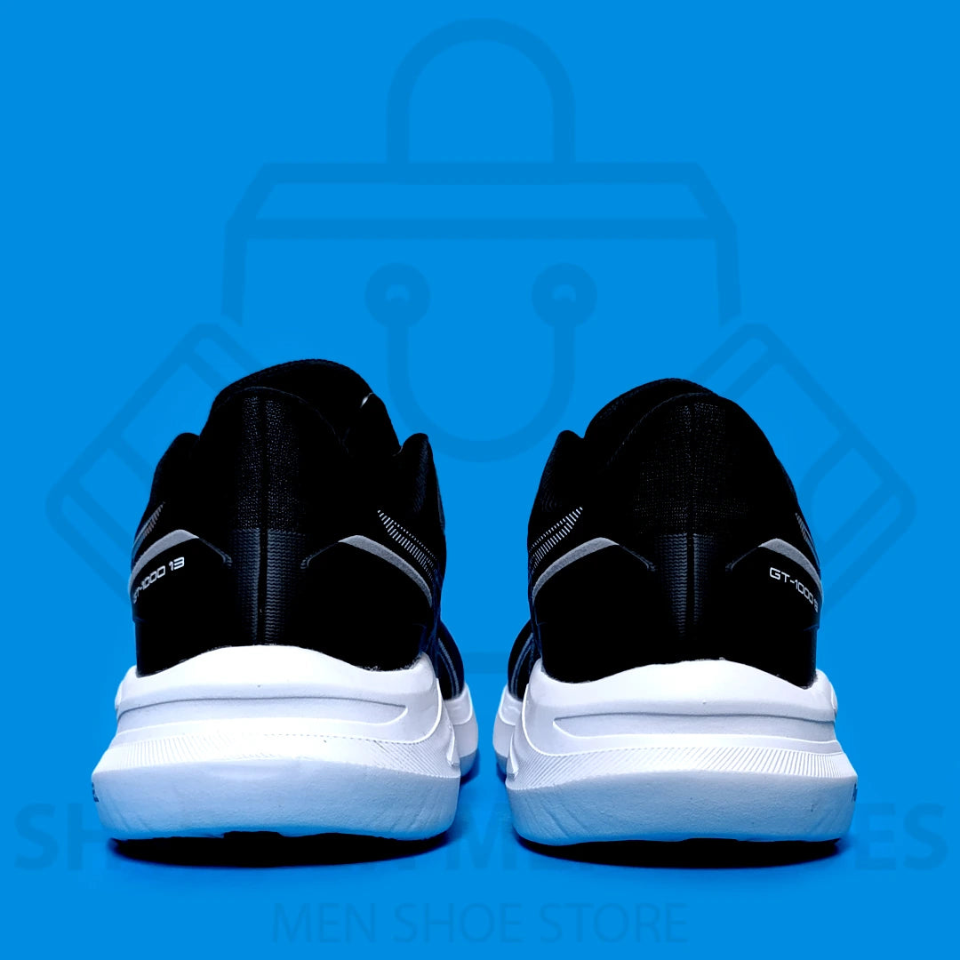 ASICS GEL "GT-1000" JOGGERS - SHOEZEN MEN SHOES - Black running shoe with white sole on a blue background