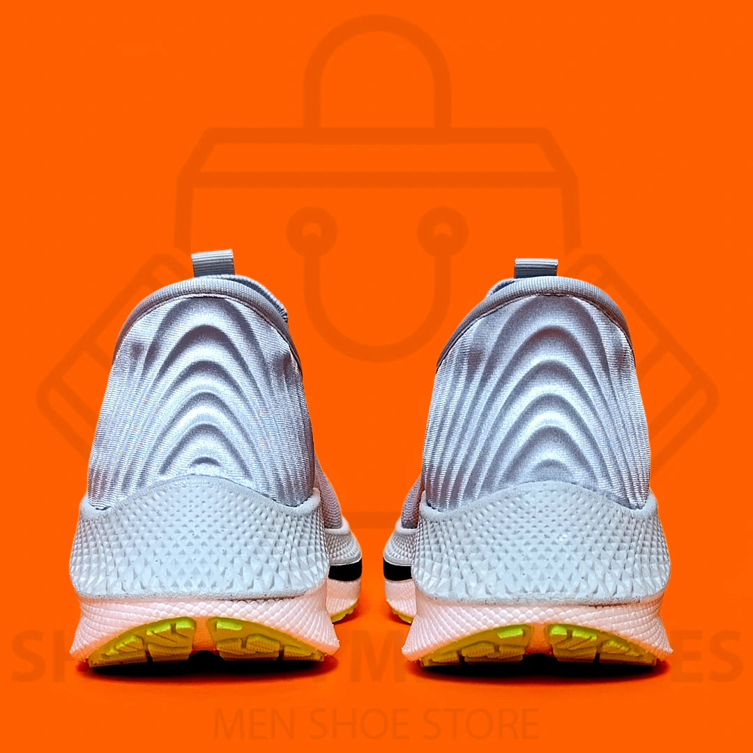 HYPER BURST PRO SLIP-INS SKECHERS - SHOEZEN MEN SHOES - Gray running shoe with green sole on an orange background