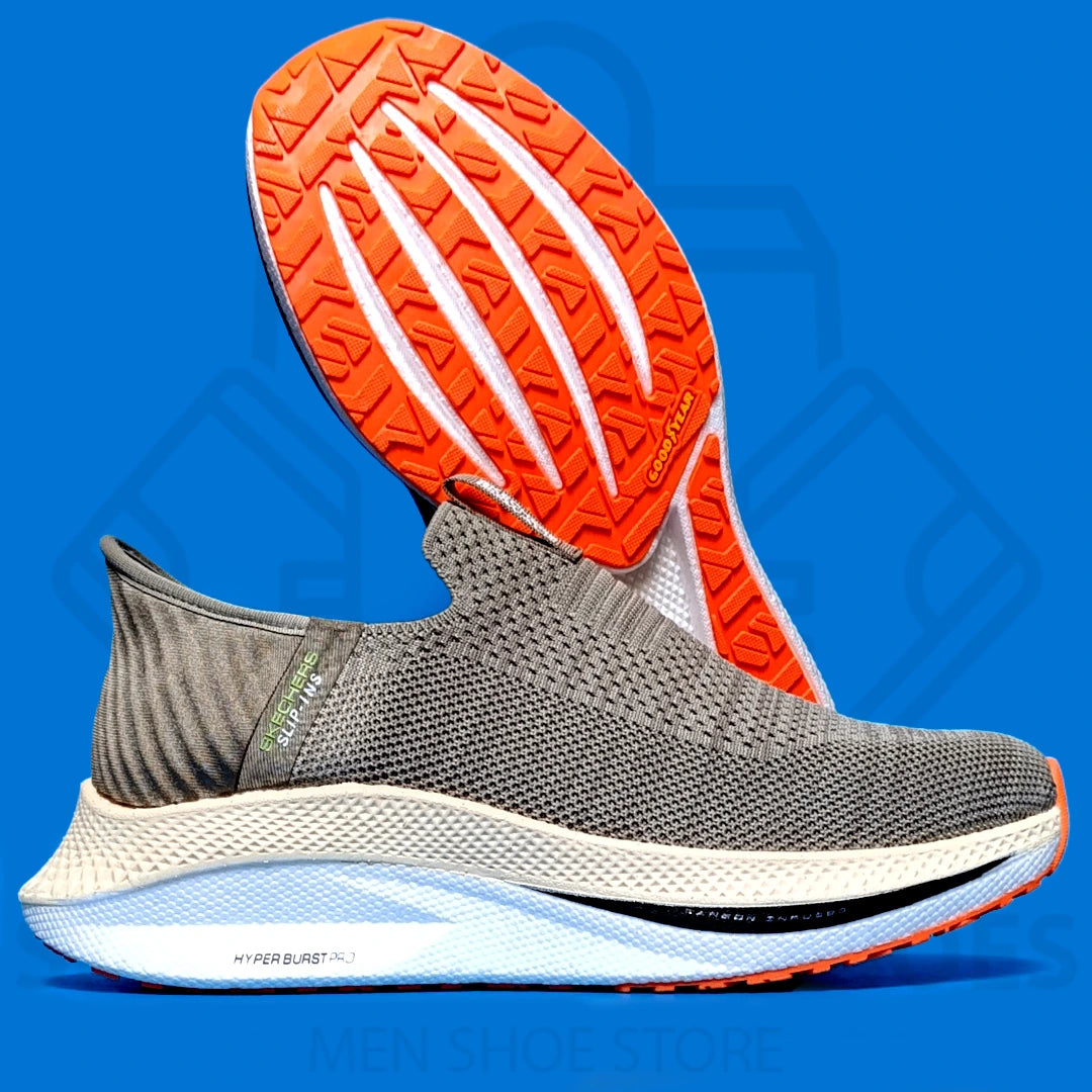 HYPER BURST PRO SLIP-INS SKECHERS - SHOEZEN MEN SHOES - Gray running shoe with orange sole on a blue background