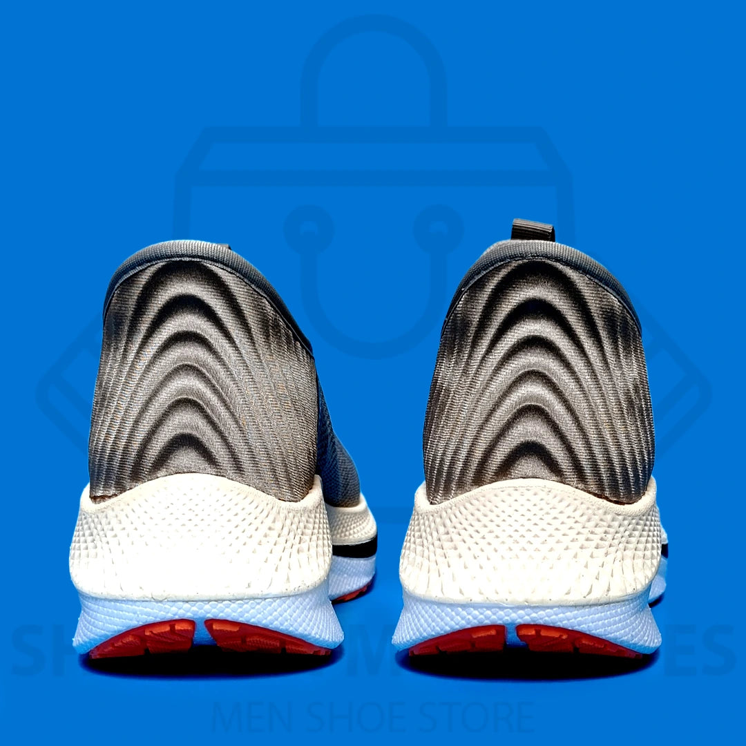 HYPER BURST PRO SLIP-INS SKECHERS - SHOEZEN MEN SHOES - Gray running shoe with orange sole on a blue background