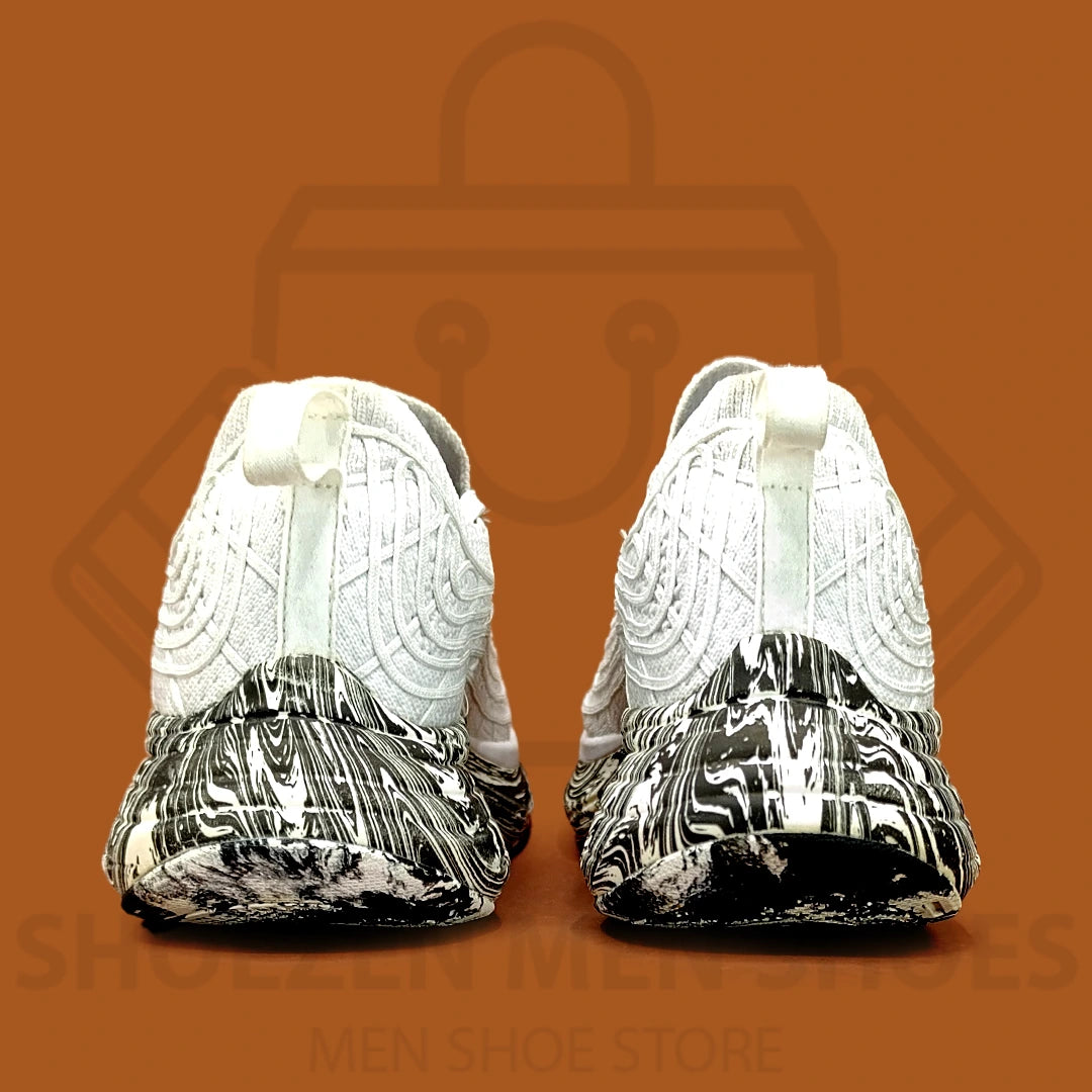 Men's TechLoom Zipline Joggers - Shoezen Men Shoes - White sneaker with black and gray abstract pattern on a brown background