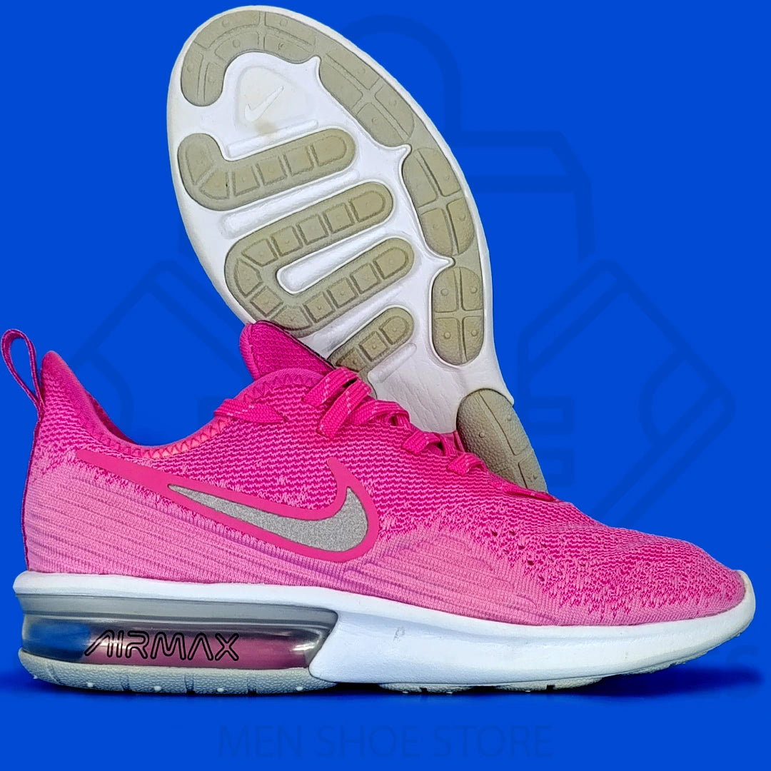 Nike Air Max Sequent 4 Women Running Shoes - Shoezen Men Shoes - Pink Nike Air Max sneaker with a blue background
