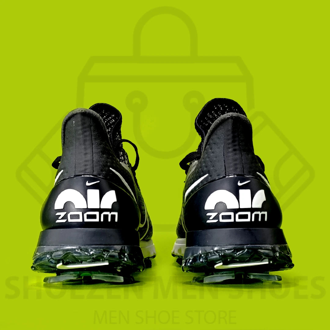 Nike Air Zoom Infinity Tour Golf Shoes - Shoezen Men Shoes - Black and white athletic shoe with a visible brand logo on a green background