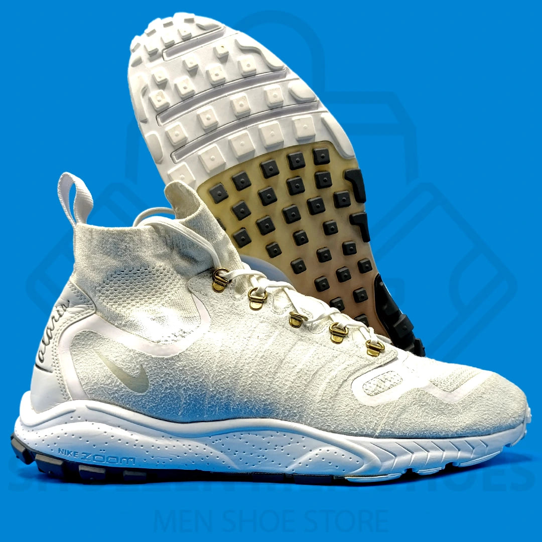 Nk Zoom Talaria Mid FK white Joggers - Shoezen Men Shoes - White sneaker with a textured sole on a blue background