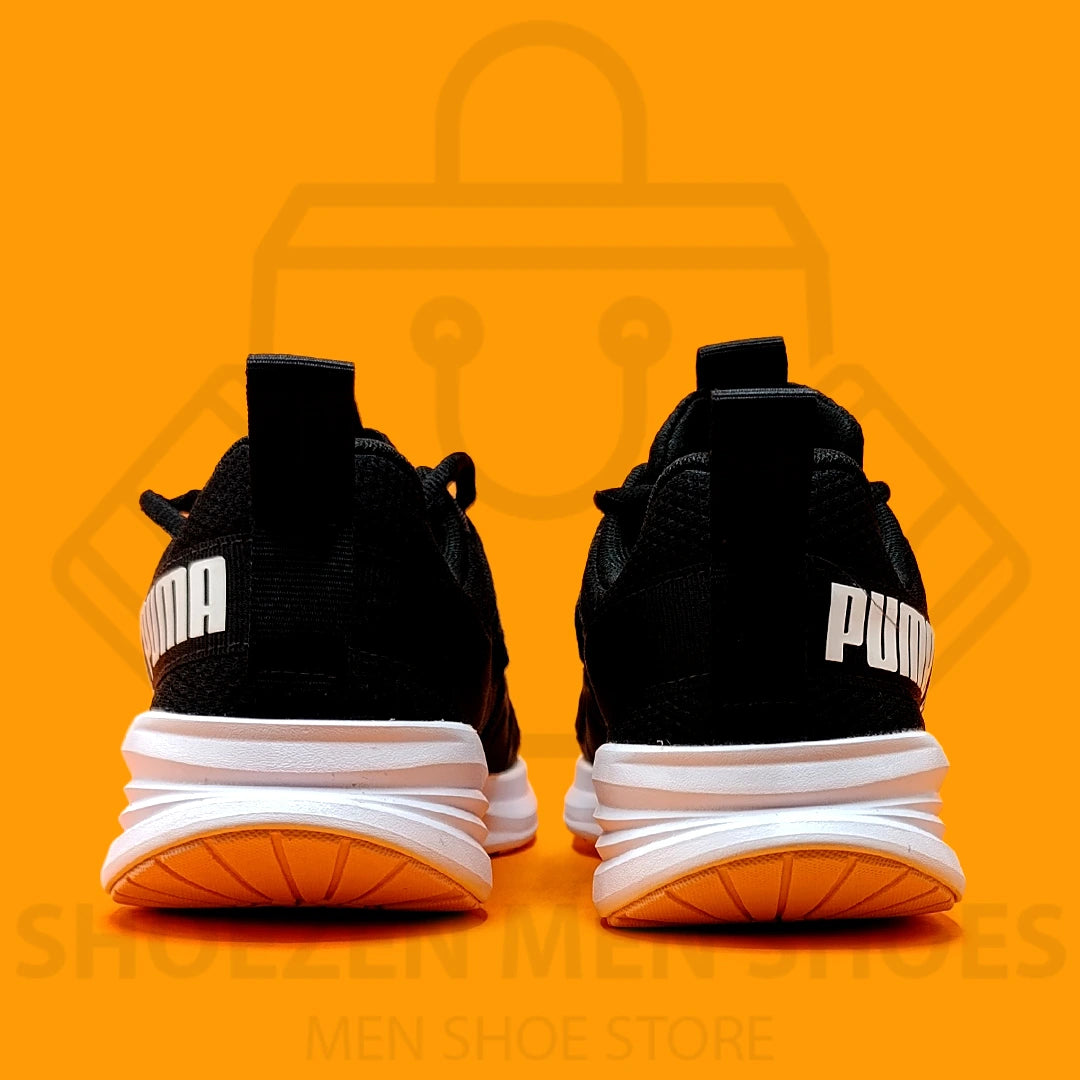 PM Black Star Vital Refresh Joggers - Shoezen Men Shoes - Black Puma sneaker with white sole on an orange background