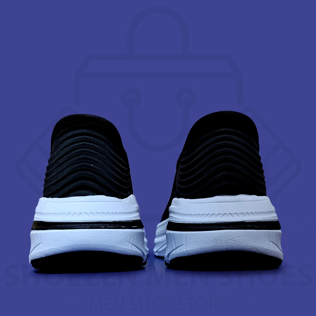 TRENDY ARCHFIT SKECHERS - SHOEZEN MEN SHOES - Black and white running shoe with visible brand logo on a blue background