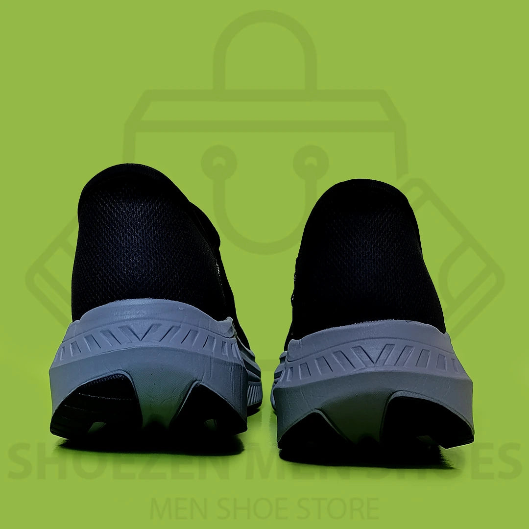 TRENDY SLIP-INS SKECHERS - SHOEZEN MEN SHOES - Black and gray sneaker with 'S' logo on a green background