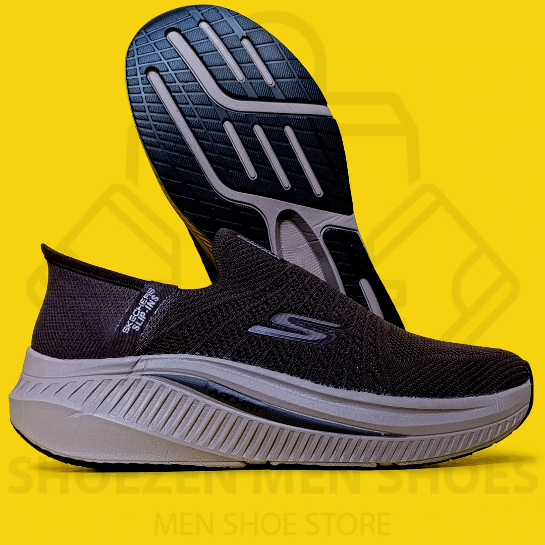 TRENDY SLIP-INS SKECHERS - SHOEZEN MEN SHOES - Black slip-on shoe with white sole on a yellow background